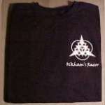 Front of the black Ockham's Razor t-shirt showing the band logo